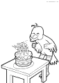 A bird blows the lights on a birthday cake