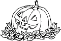 Halloween pumpkin is in a leafy heap